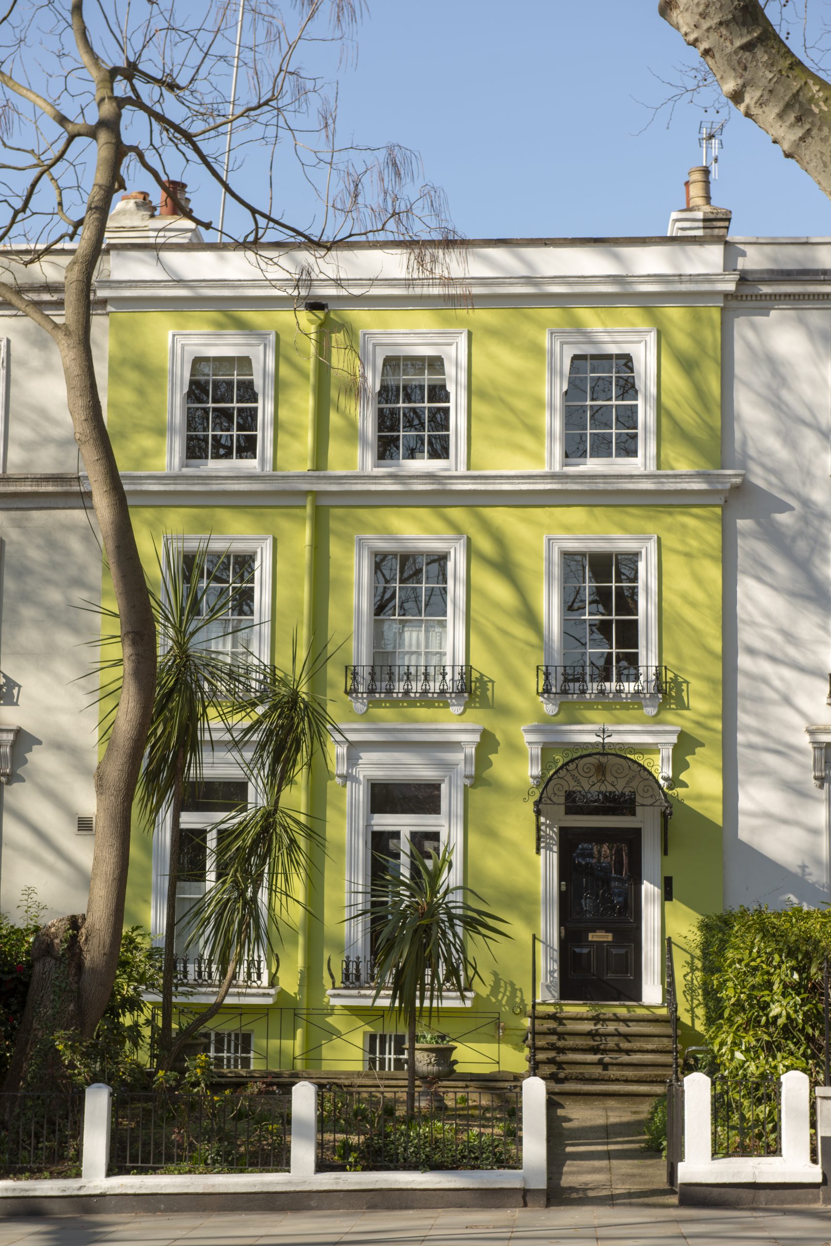 https://hillcrestpaintingandflooringservices.com.au/wp-content/uploads/2025/07/front-view-front-door-with-yellow-wall-plants-scaled.jpg